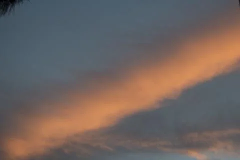 Unusual sunset and cloud light Stock Photos