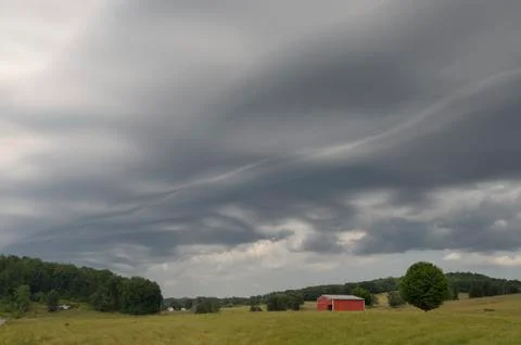 Unusual wave cloud storm front approaches. 스톡 사진