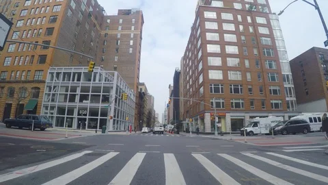 Unusually Empty NYC Intersection during the Coronavirus Pandemic Restrictions Stock Footage 128541964