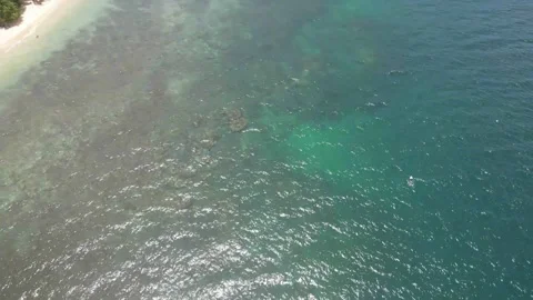 Unveiling a Pristine Paradise: Drone 4K RAW Stock Footage 266898446