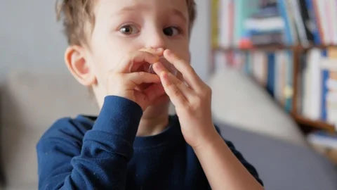 Unwell, sick boy drinking syrup, medicine, medication Stock-Footage 87123496