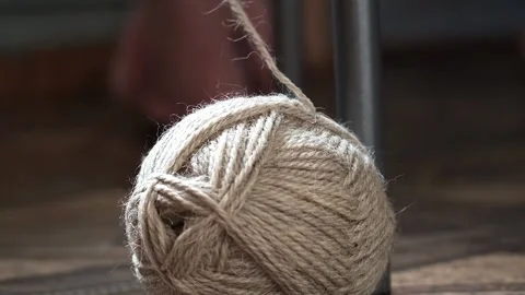 Unwinding a ball of thread. Stock Footage 169984851