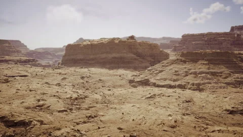 Unworldly desert environment featuring barren ground and expansive sky Stock Footage 340659170