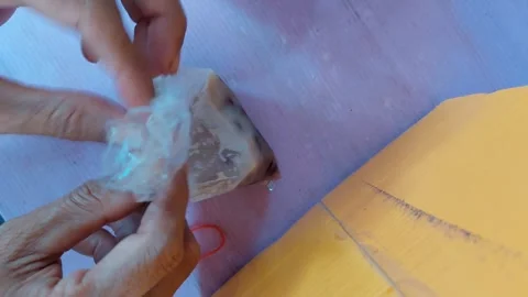 Unwrap the bag of sweets Stock Footage 265632623