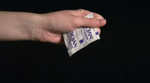 Unwrapping a Condom 1 動画素材 22333294