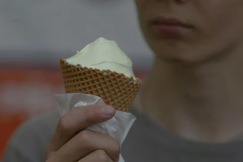 An upclose image capturing person deciding to eat treat smoothly Stock Photos