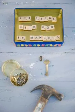 Upcycled metal box used as pinboard with magnets Stock Photos