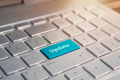 Update Button on Keyboard, Color button on the gray silver keyboard of modern Stock Photos