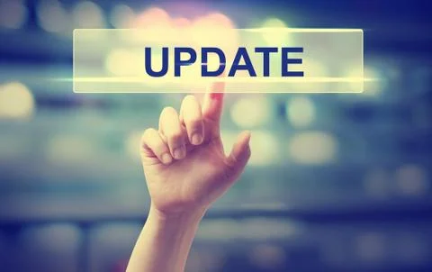 Update concept with hand pressing a button Stock Photos