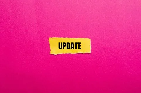 Update message written on ripped torn paper background. Conceptual Update s.. Stock Photos