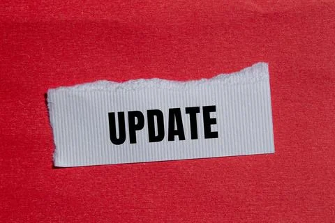 Update message written on ripped torn paper background. Conceptual Update s.. Stock Photos