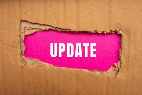 Update message written on ripped torn paper background. Conceptual Update s.. Stock Photos