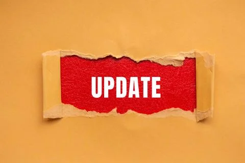 Update message written on ripped torn paper background. Conceptual Update s.. Stock Photos