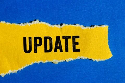 Update message written on ripped torn paper background. Conceptual Update s.. Stock Photos