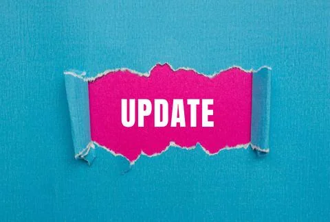Update message written on ripped torn paper background. Conceptual Update s.. Stock Photos