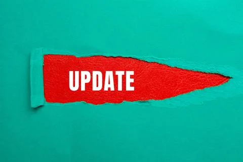 Update message written on ripped torn paper background. Conceptual Update s.. Stock Photos
