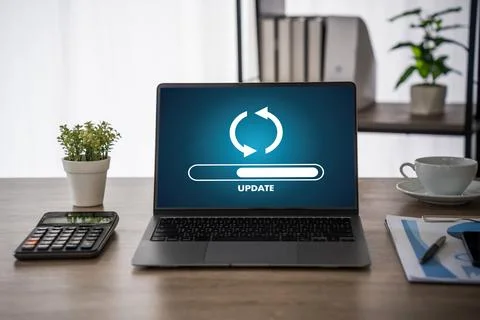 Update software application Person using laptop with software update progre.. Stock Photos