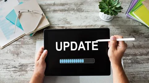 Update status bar on device screen. Software development and technology concept. 스톡 사진