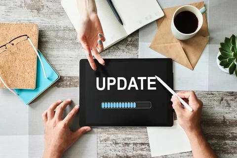 Update status bar on device screen. Software development and technology concept Stock Photos