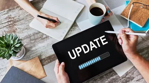Update status bar on device screen. Software development and technology concept. Stock Photos
