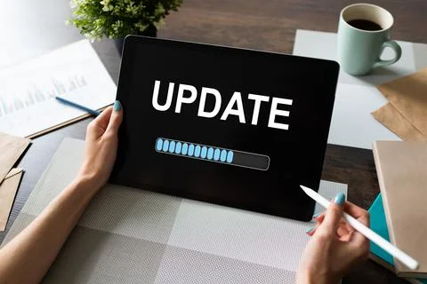 Update status bar on device screen. Software development and technology concept. Stock Photos