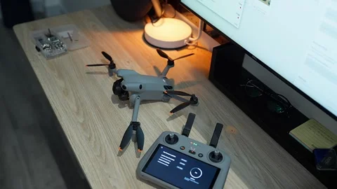 Updating DJI Mini 5 Pro firmware at Ho Chi Minh City studio on September 5 2026 Stock Footage 345630255