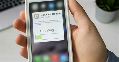 Updating smartphone system software Stock Footage 78516396