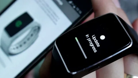 Updating smartwatch Stock Footage 76626761