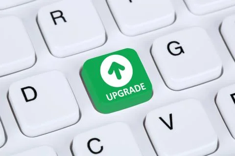 Upgrade upgrading software program icon symbol on computer keyboard Stock Photos
