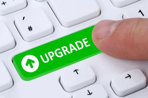 Upgrade upgrading software program symbol on computer keyboard 스톡 사진