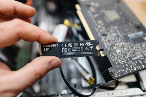Upgrading Computer with Samsung SSD and Certification Logotypes Stock-Fotos