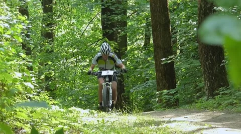 Uphill on a bicycle Stock Footage 54990719