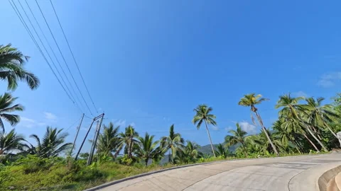 Uphill mountain of POV mini drone shot showing a dramatic right-side cliff Stock Footage 339513380