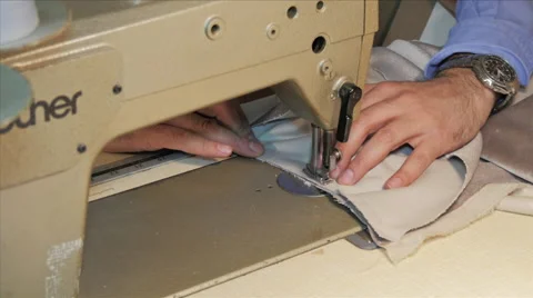 Upholstery, Man Using a Sewing Machine Stock Footage 40329733