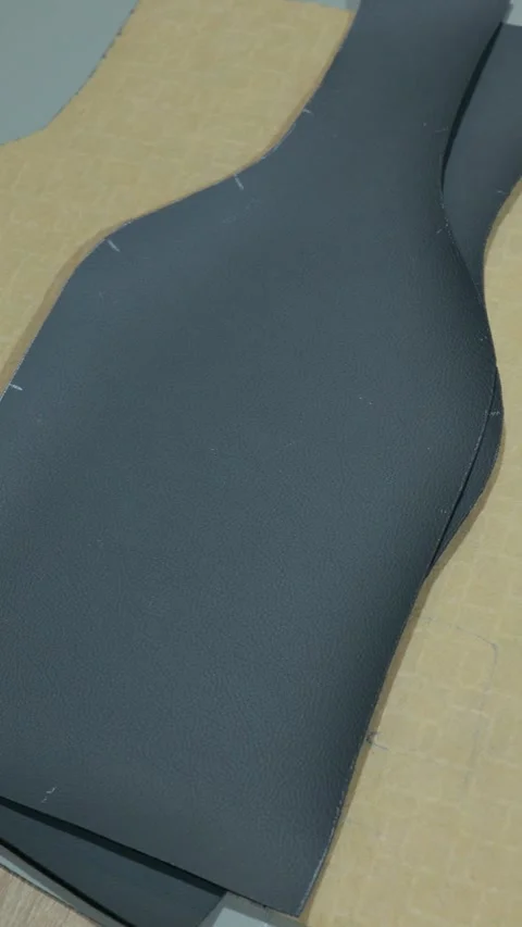 Upholstery Paper Pattern on Leather Material Stock Footage 329325759
