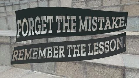An uplifting quote, FORGET THE MISTAKE, REMEMBER THE LESSON, displayed on a.. Stock Photos