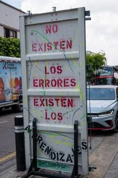 Uplifting street message, 'No Errors, Only Learnings,' vibrant Tlaquepaque, Stock Photos