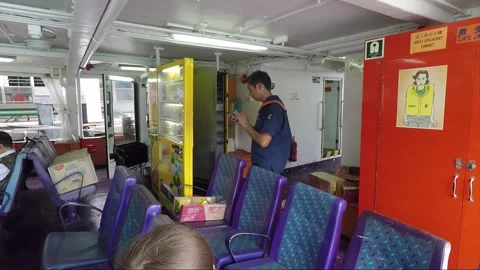 Uploading the vending machine, inside ferry boat, Hong Kong Stock Footage 153040312