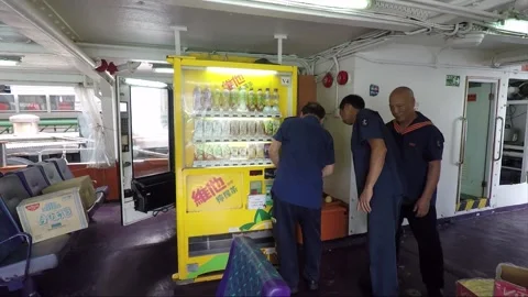 Uploading the vending machine, inside ferry boat, Hong Kong Stock Footage 153044003