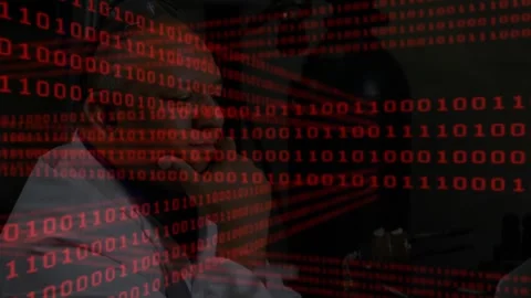 Upon binary code overlay appearing, IT tech reaching for keys and typing in data Stock Footage 318194596