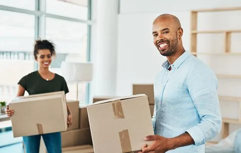 Upon first sight we knew we had to buy this place. Portrait of a couple young Stock Photos