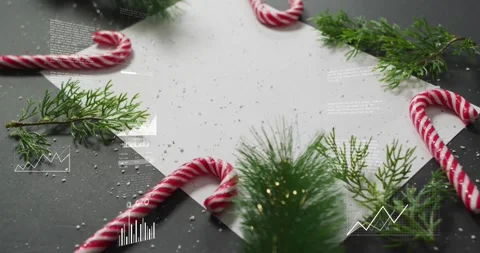 Upon flat lay reveal HUD elements glowing and animating charts, visualizing Stock Footage 317773271