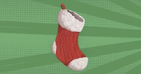 Upon initial load, knitted stocking swaying and rotating on green dotted Stock Footage 315525626