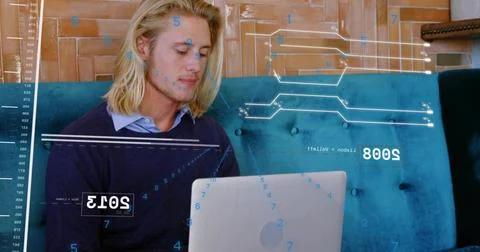 Upon laptop input man sitting using laptop overlays showing years and streaks Stock Photos