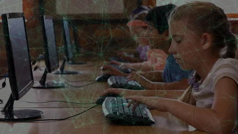 Upon loading assignment, students typing keyboards and clicking mice in lab Stock Footage 312360916