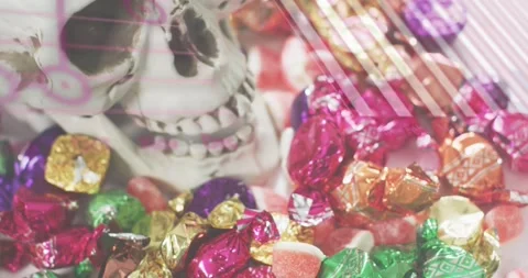 Upon opening skull and candy pile receiving swirling notation, neon stripes and Stock Footage 317772414