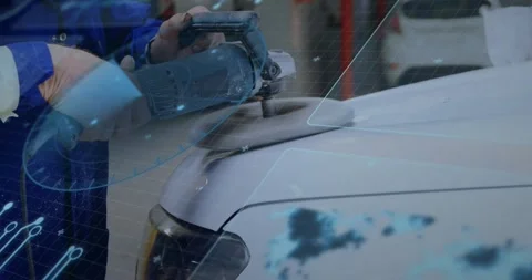 Upon powering buffer, technician gloved hands buffing car hood surface for Video stock 330594311