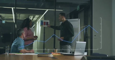 Upon showing color coded chart business team annotating and reviewing data with Stock Footage 310972502