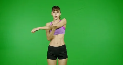 Upper arm stretching, green screen, excerise, stretching. Fit young asian sport Stock Footage 120618077