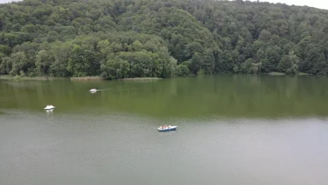 Upper Blue Lake Boat Drone Orbit 4K Stock Footage 336949453